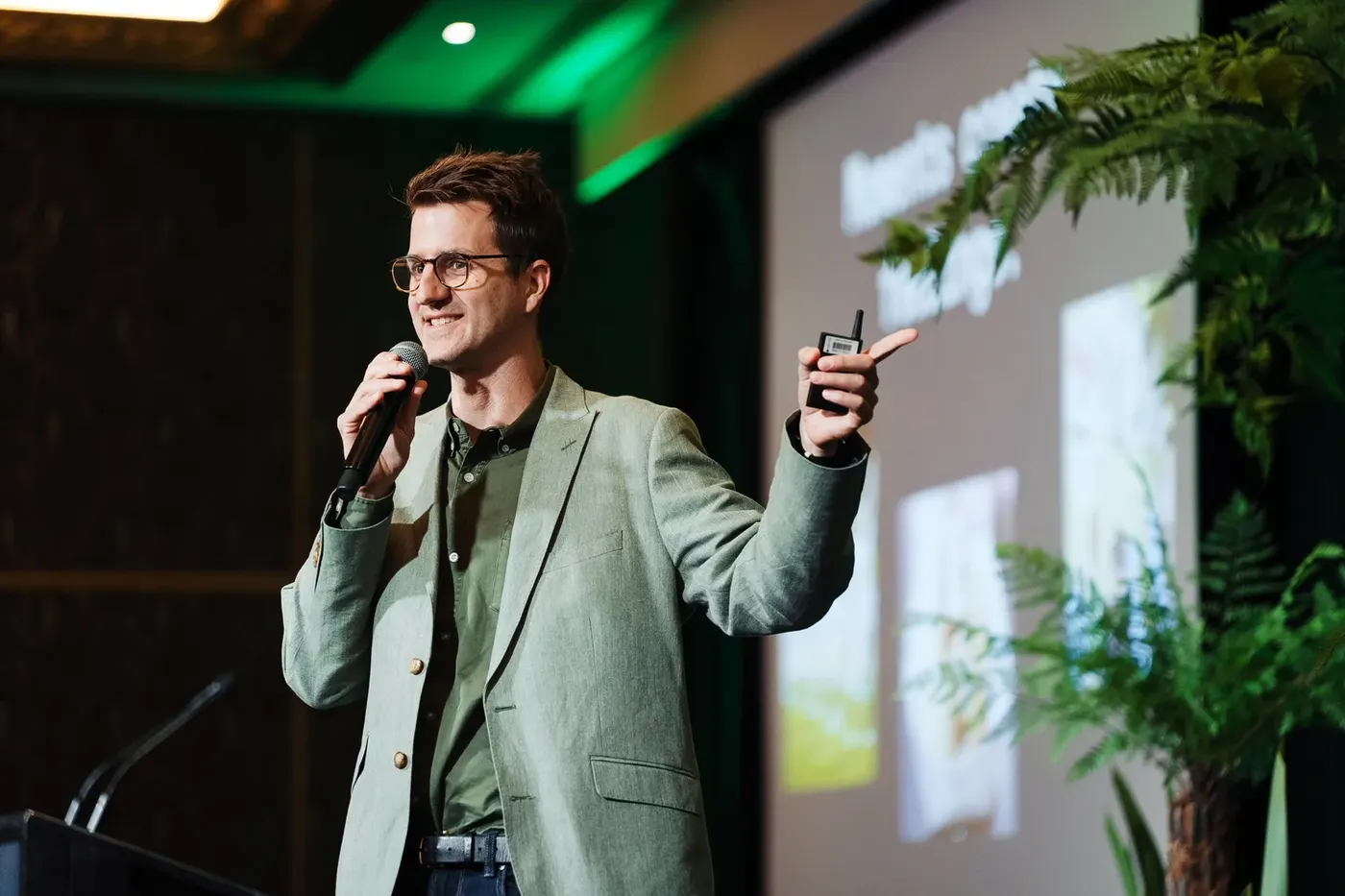 Brad speaking on stage at the BEIA conference, 2025