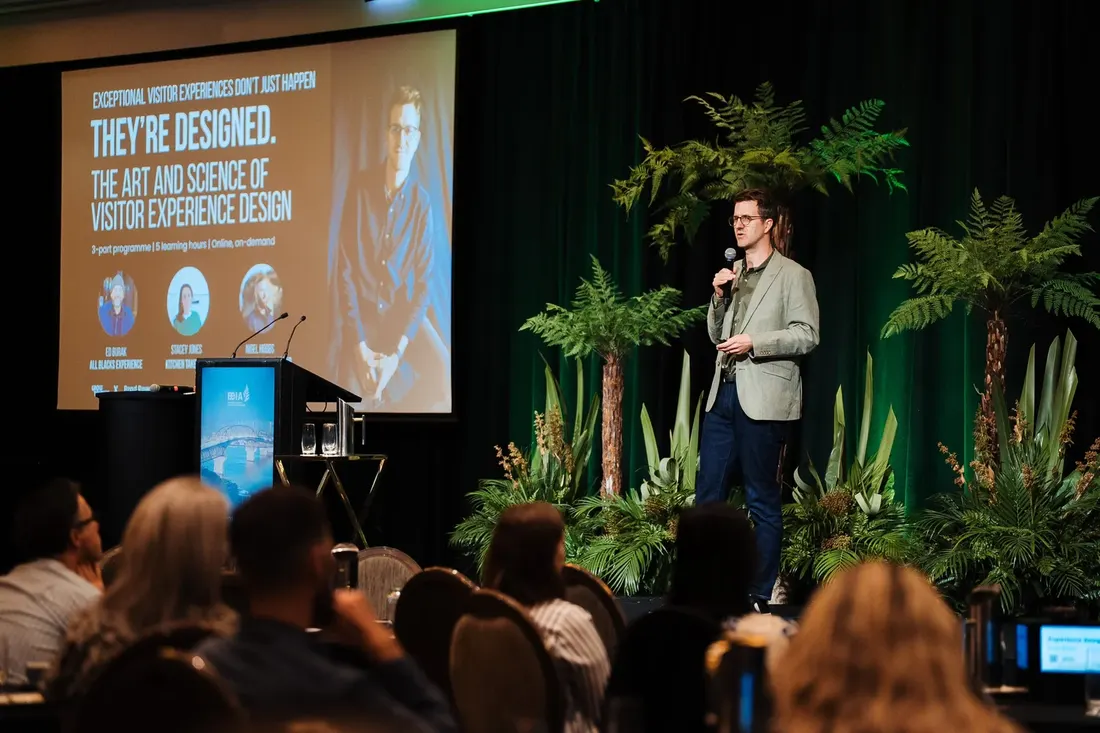 Wide shot of Brad presenting at BEIA
